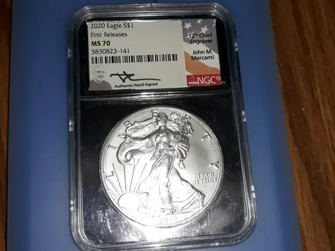 A 2020 Silver Eagle in a black NGC holder graded MS 70